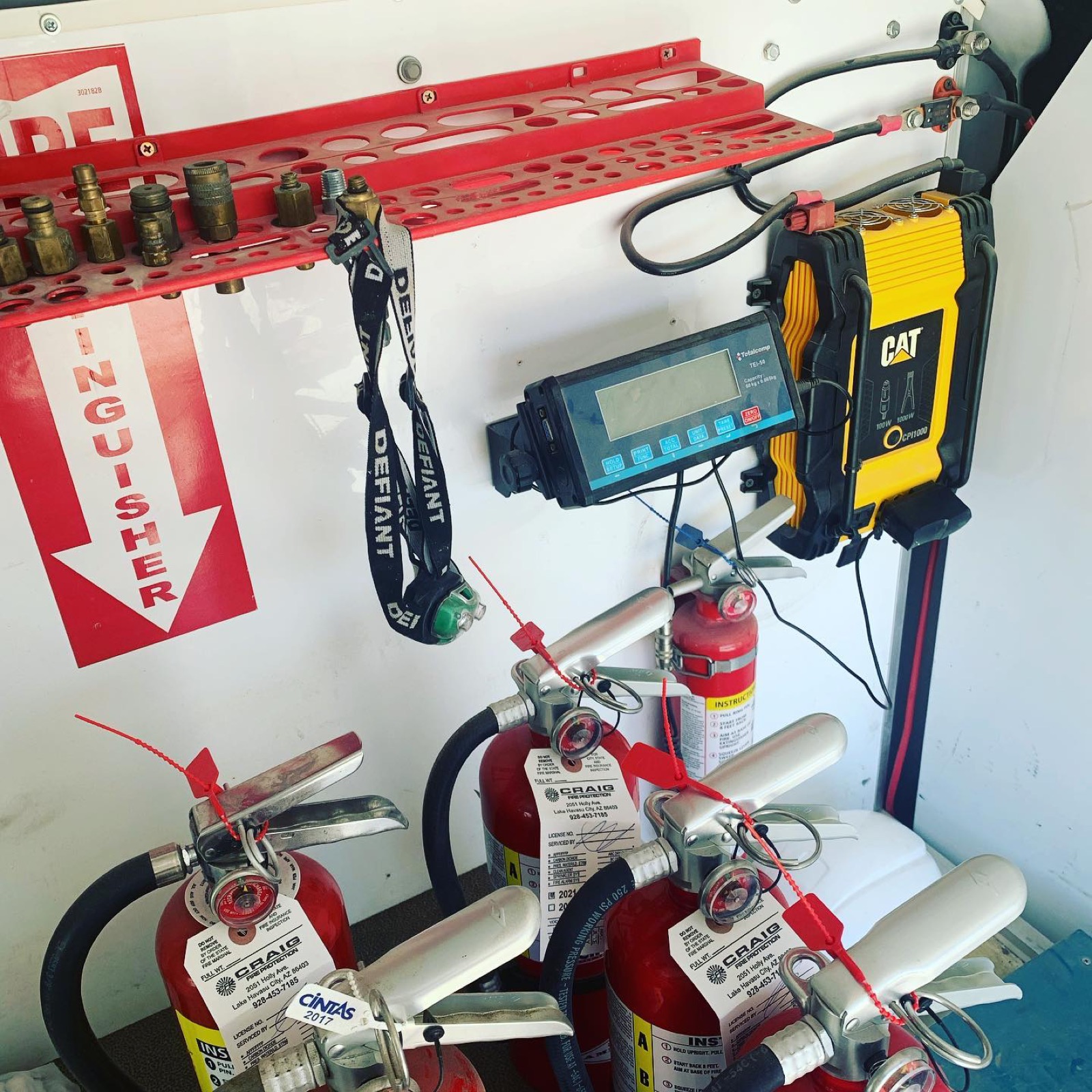 Extinguisher service bench inside a Craig Fire van