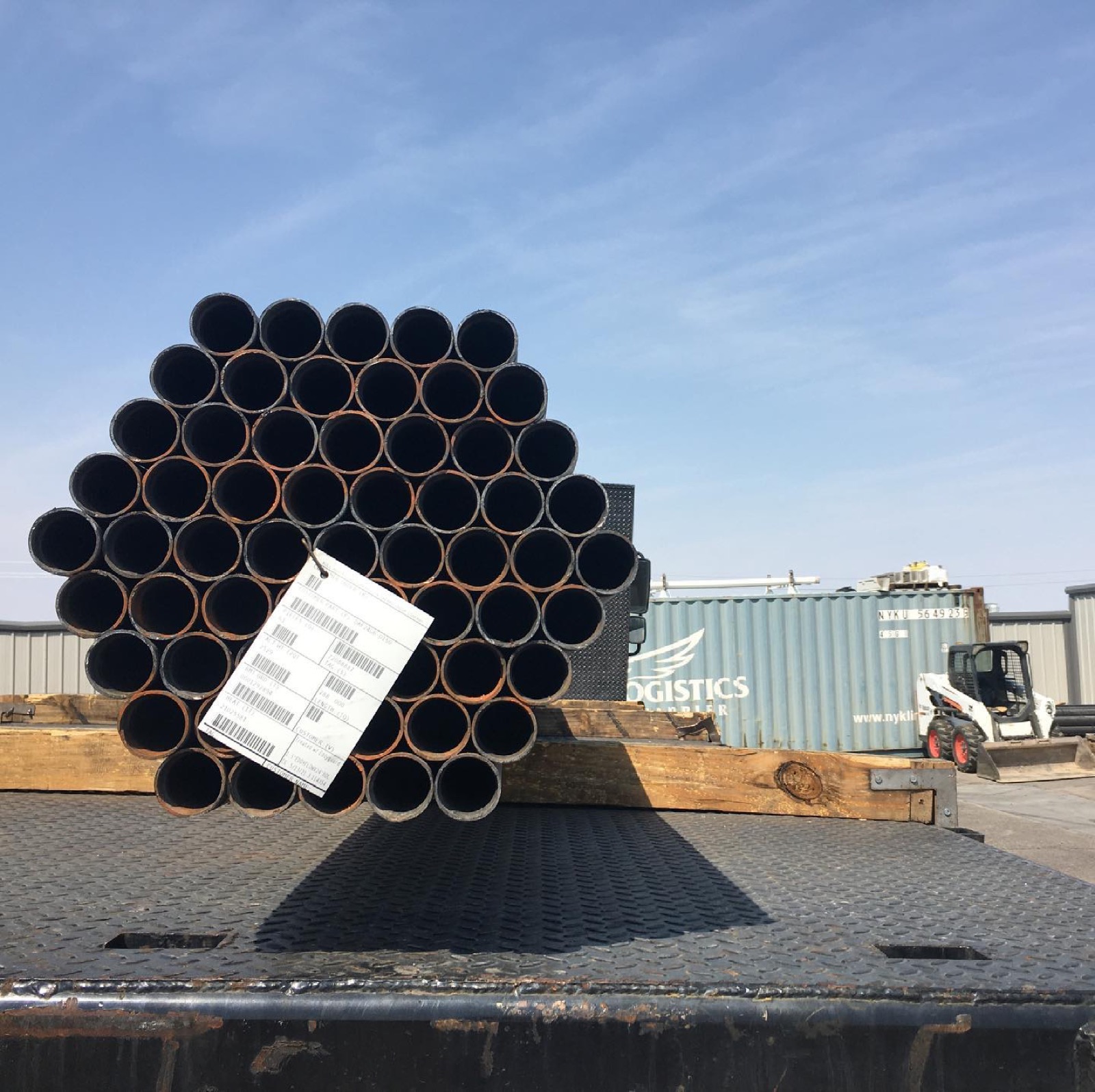 Sprinkler pipe delivery on the flatbed